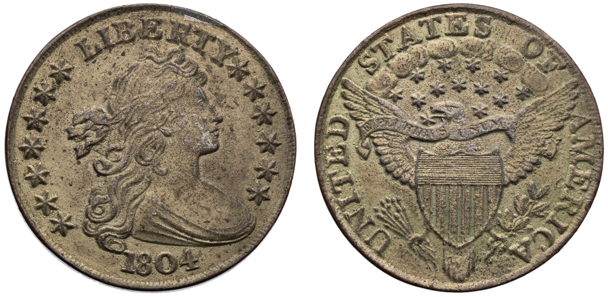 A white metal 1804 dollar catalogued as a forgery by the American Numismatic Society