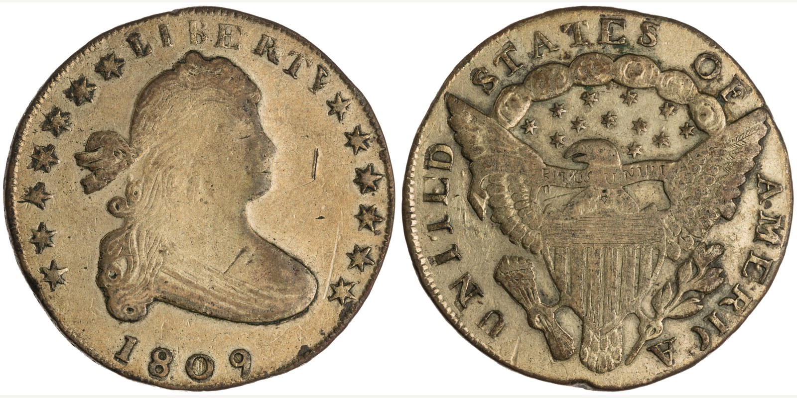 Obverse and reverse of a brass half dollar dated 1809, catalogued by the American Numismatic Society