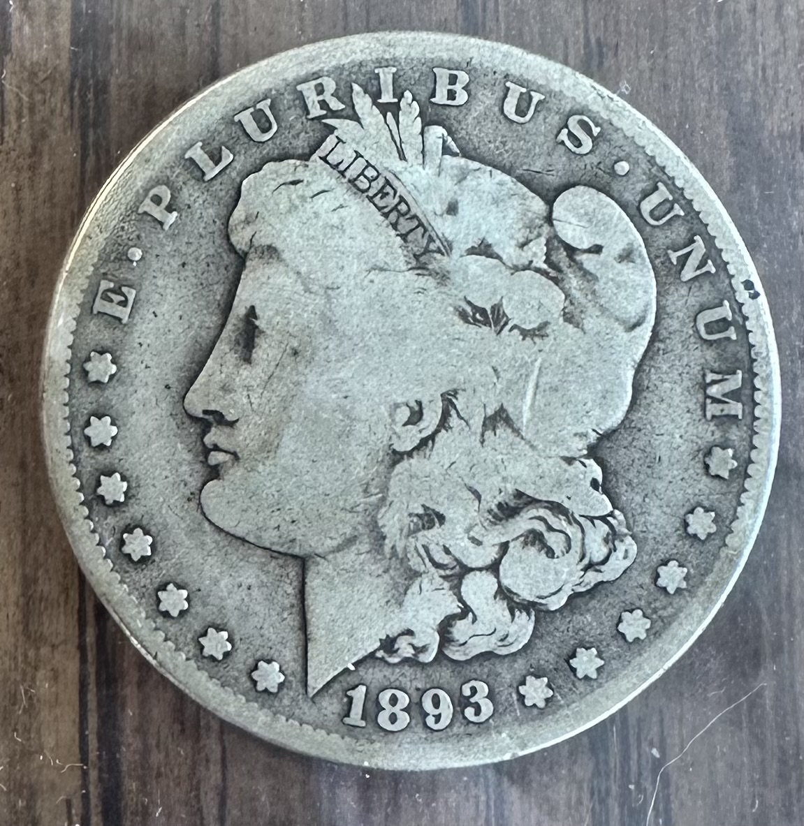 1893-S Morgan dollar obverse — a well-worn circulated example